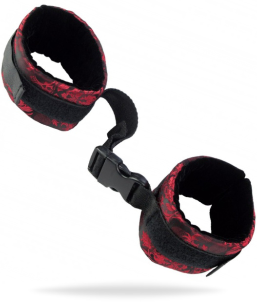 Detaljerade vristfängsel med justerbar kardborre. Högkvalitativ polyester och bekväm passform. Slitstarkt material.